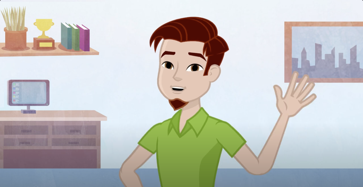 A young man waving while standing in his bedroom room surrounded by a computer desk and book shelf.